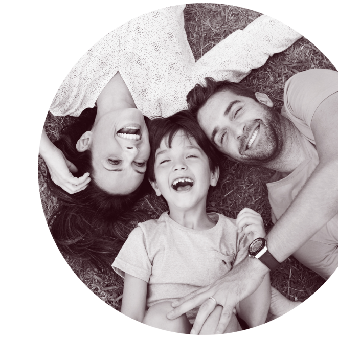 family of three smiling