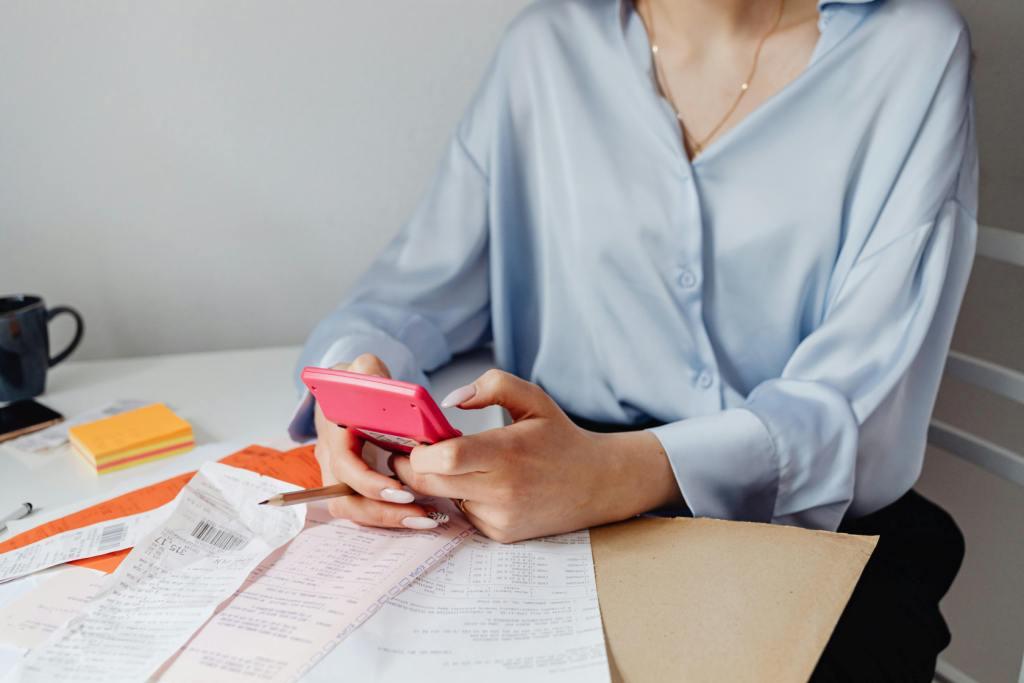 Canadian adult reviewing will costs and options at kitchen table with calculator